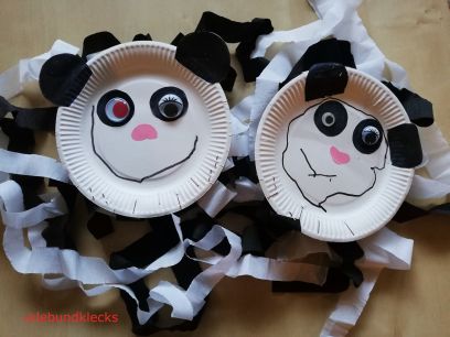 Panda aus Pappteller und Kreppband für Spiele bei Weltreise