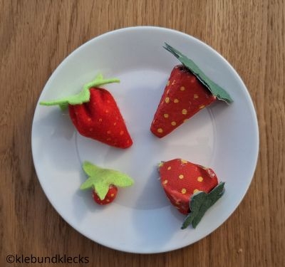 Erdbeeren aus verschiedenen Materialien