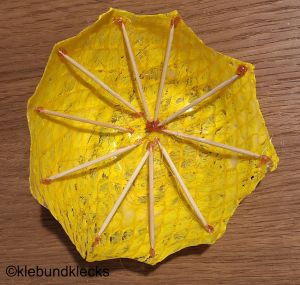 Regenschirm mit Zahnstochern stabilisieren