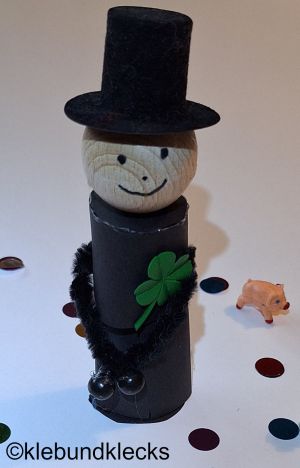 Kaminkehrer mit Überraschung im Bauch