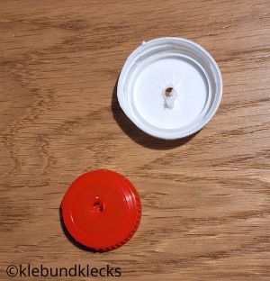 Loch in Verschlusskappen bohren