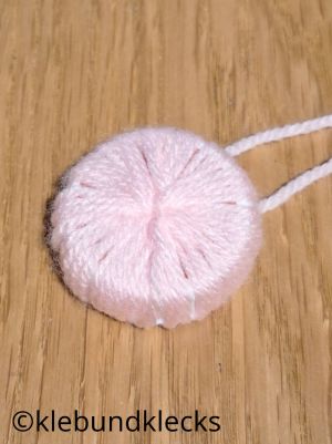 Verschlusskappe dank Woll nicht mehr zu sehen