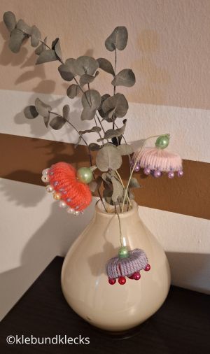 Wollblumen aus Verschlusskappen