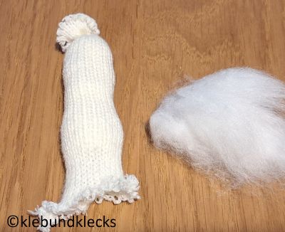 Strickschlauch mit Watte füllen