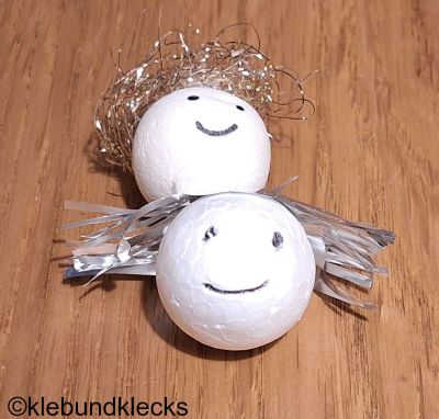 Gesichter auf Kugeln malen