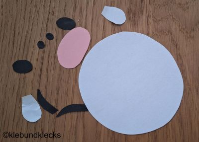 Kuh-Gesicht aus Tonpapier ausschneiden
