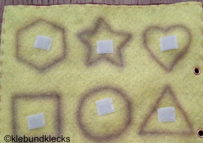 Formen auf Filzstück malen