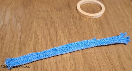 Strickschlauch aufschneiden